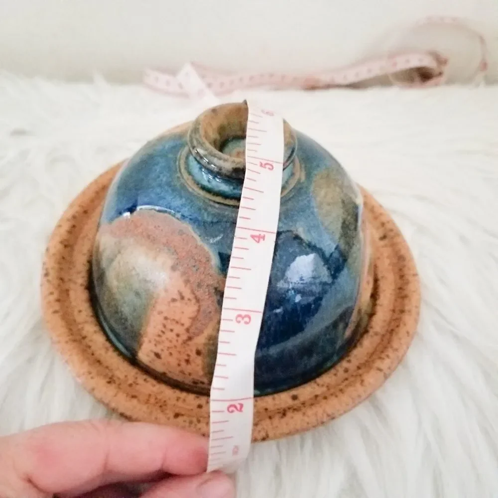 Pottery covered plate earth tones with blue